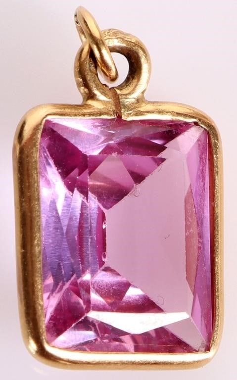 18K YELLOW GOLD ~6.73CT PINK SAPPHIRE PENDANT: 18K yellow gold ~6.73ct pink sapphire ladies pendant. Gemstones to include one 11.77mm X 10.50mm X 5.50mm radiant cut ~6.73ct pink sapphire.Stone Type: SapphireWeight: 2.00 GramsSize: 0.75"Condition: