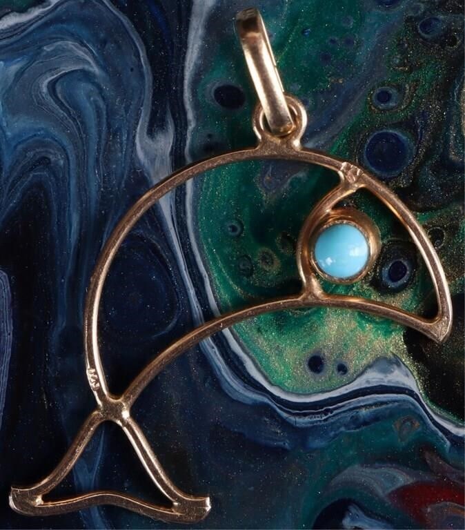 VINTAGE 18K YELLOW GOLD JUMPING DOLPHIN PENDANT: This vintage 18K yellow gold jumping dolphin has a turquoise eye.Stone Type: TurquoiseCondition: No bends in the pendant. See images for complete condition.