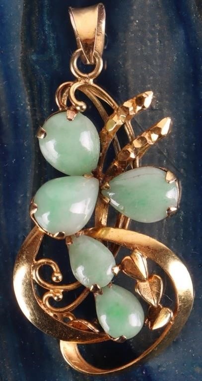 14K YELLOW GOLD GREEN JADE LADIES PENDANT: 14K yellow gold green jade ladies pendant. Gemstones to include two 0.30ct tear drop cabochon green jade and three 0.50ct tear drop cabochon green jade.Stone Type: JadeWeight: 2.88 GramsSize: 1.50"Con