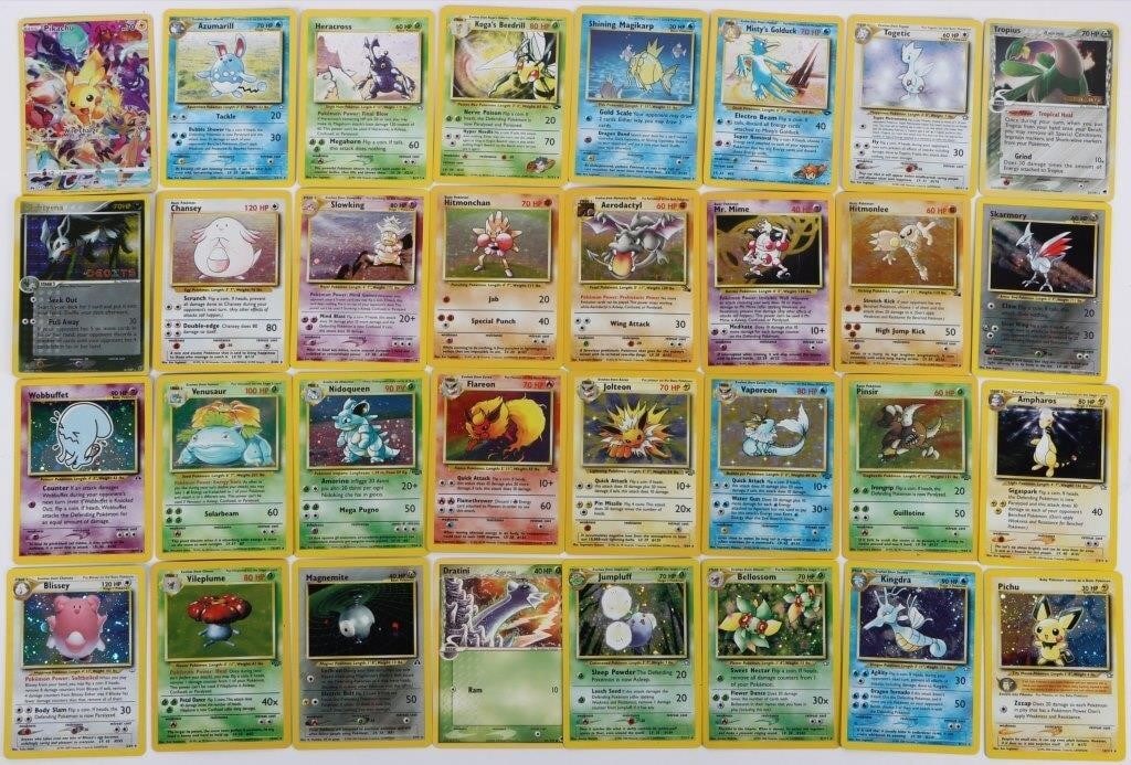 HOLO POKEMON CARDS LOT BULBASAUR EVEE EVOS ETC-32: Lot of thirty-two holographic Pokemon TCG cards. Notable pieces include Venusaur (15/102), Nidoqueen (7/64), Flareon (3/64), Jolteon (4/64), Vaporeon (12/64), Chansey (3/102), six other base, jungle,