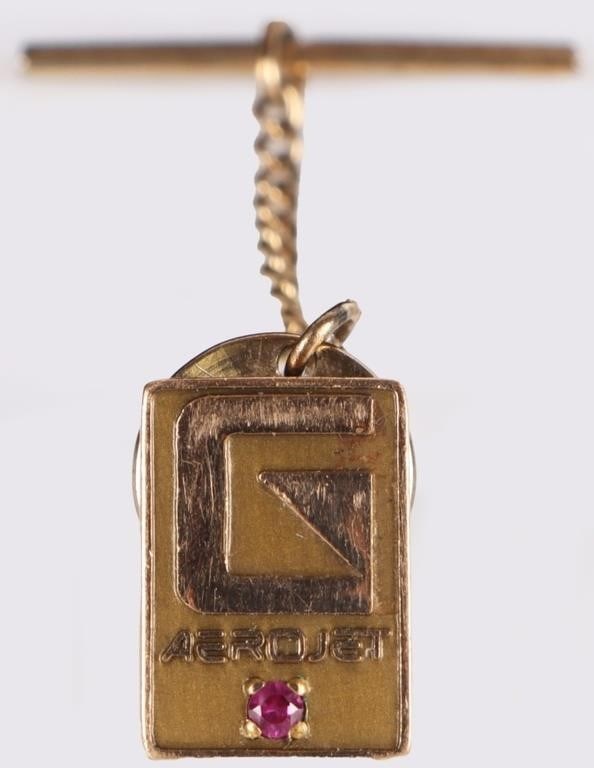 10K YELLOW GOLD MENS NECKTIE PIN AEROJET SAPPHIRE: Vintage collectible 10k yellow gold mens Aerojet necktie tank pin, to include a 0.04ct pink sapphire gemstone. The pin back is metal costumeStone Type: SaphWeight: 2.13 gold weightSize: 14.2 x 10