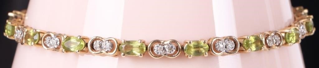 14K YELLOW GOLD LADIES BRACELET W/ SPINEL & DIAS: 14k yellow gold ladies bracelet with an alternating link pattern of oval-cut green spinel (fifteen total) and two melee diamonds (thirty total). Stone Type: Diamonds & Spinel Weight: 8.18 grams Size: 