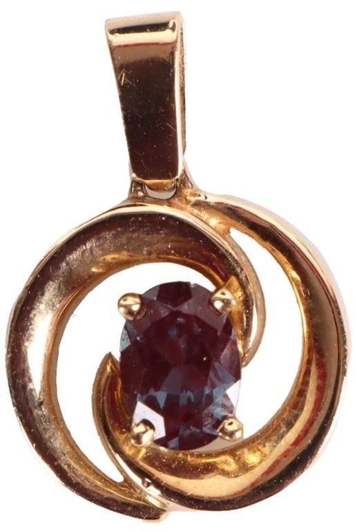 14K YELLOW GOLD LADIES PENDANT W/ BICOLOR SAPPHIRE: 14k yellow gold ladies pendant molded in a swirl shape with a 0.5ct oval-cut heat-treated bicolor center sapphire. Stone Type: Sapphire Weight: 3.57 grams Size: 21.35 x 14.6 mm Condition: See pictures