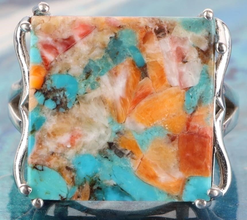 STERLING SILVER SPINY OYSTER TURQUOISE LADIES RING: Sterling silver spiny oyster turquoise ladies ring. Gemstones to include one square vibrant spiny oyster turquoise. Stone Type: Turquoise Weight: 10.62 Grams Size: 9.00 U.S. Condition: Little to no we