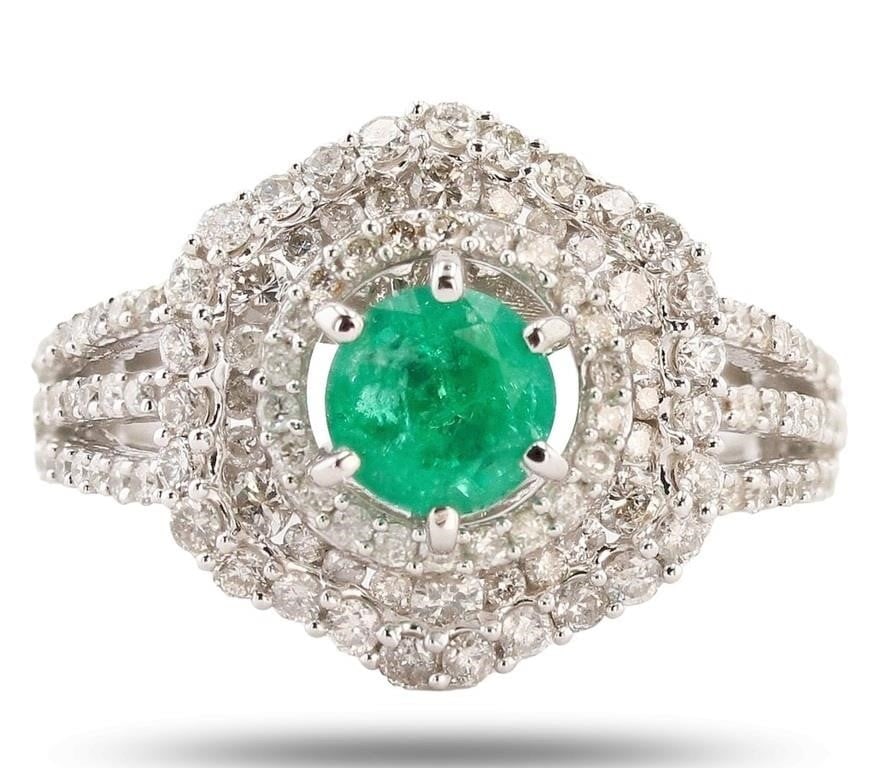 1.09CTW DIAMOND 14K WHITE GOLD RING W/ EMERALD NEW: One polished, stamped, and tested 14K white gold ring with a bright finish. The ring is mounted with: 1 genuine emerald center stone weighing approximately 0.91 carat, and 116 genuine round diamonds w