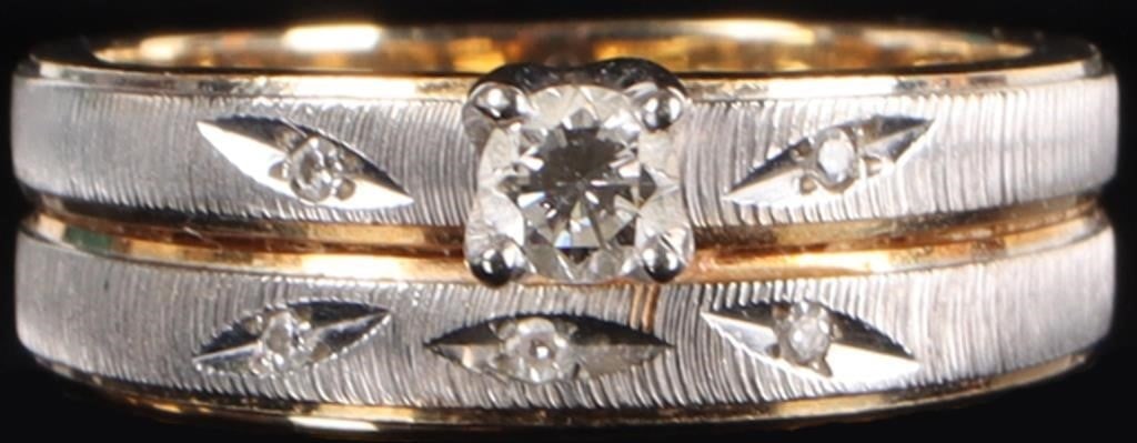 14K YELLOW/WHITE GOLD LADIES 2X BANDED RING W/ DIA: 14k yellow/white gold ladies double-banded ring. Each band is yellow gold with a textured white gold surface. The top band features a 0.25ct round-cut diamond flanked by two 0.01ct round-cut diamonds,