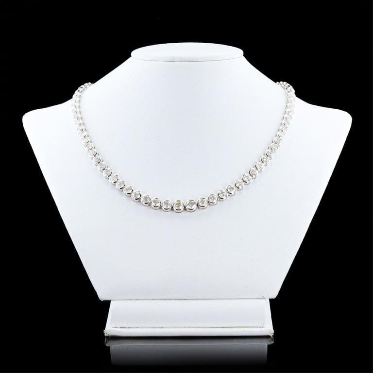 22.6CTW DIAMOND G-I SI2-I2 14K WHITE GOLD NECKLACE: One polished, stamped, and tested 14K white gold necklace marked Sheffield & Sons. The necklace is mounted with 85 genuine round diamonds weighing approximately 22.60 carats. The necklace measures 17 