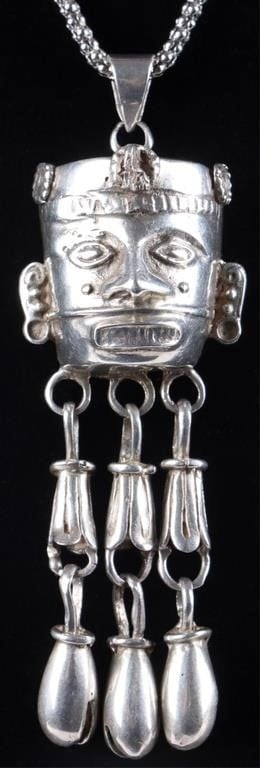 EXOTIC STERLING SILVER AZTEC GOD NECKLACE W/ BELLS: Exotic sterling silver ladies necklace with a mask pendant of an Aztec god with three bells dangling beneath it. Weight: 27.74 grams Size: 24" long Condition: See pictures.