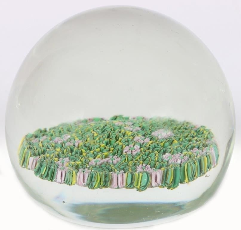 VINTAGE MURANO ART GLASS MILLIFLORI PAPERWEIGHT: Vintage Murano art glass Italian Milliflori paperweight depicting a grassy patch with pink flowers. Has original Murano sticker on bottom. Size: 3.5" Length Condition: Very fine.