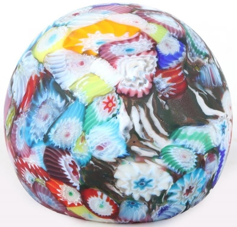 VINTAGE MURANO ART GLASS MILLIFLORI PAPERWEIGHT: Vintage Murano art glass Italian Milliflori paperweight depicting a rainbow of flowers on a matte surface. Size: 3.0" Length Condition: Very fine.
