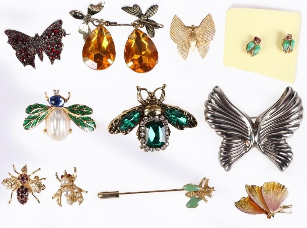 BUG-THEMED LADIES BROOCHES & EARRINGS (11): Assorted lot of eleven bug-themed ladies brooches & earrings. To include two pairs of earrings, one in the shape of a ladybug, another in the shape of a squat dragonfly affixed to a large orange stone
