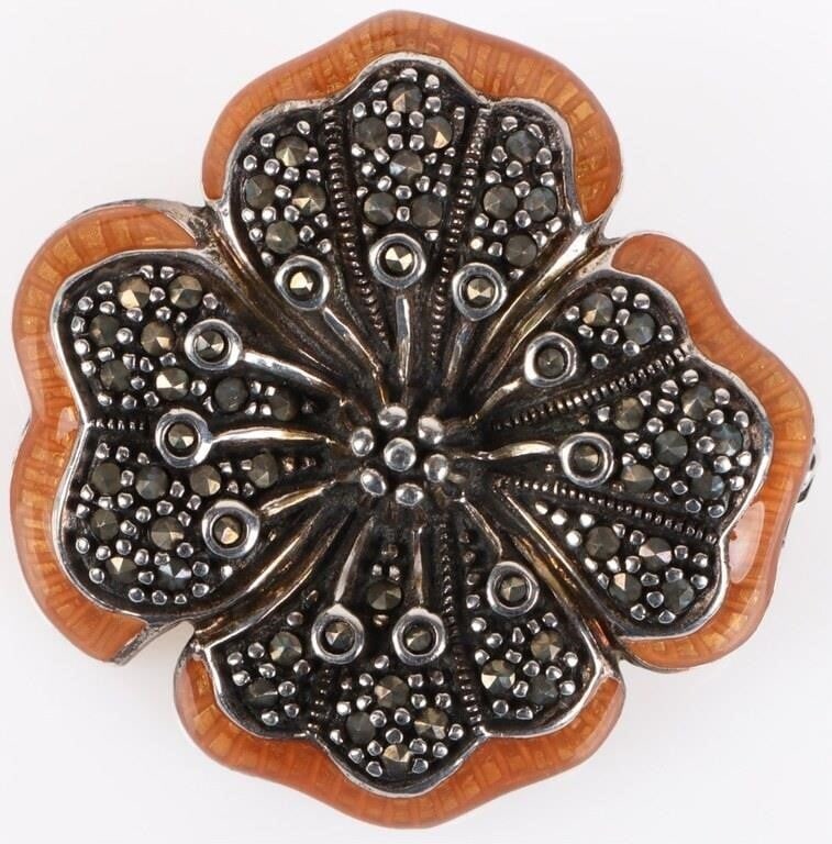 STERLING SILVER LADIES BROOCH FLOWER SPINEL: Well-detailed sterling silver ladies brooch with floral design dotted with 1ct spinel gems. An orange stone forms a border along the extremities of the petals. Weight: 13.68 Size: 1.5" wide Condition:
