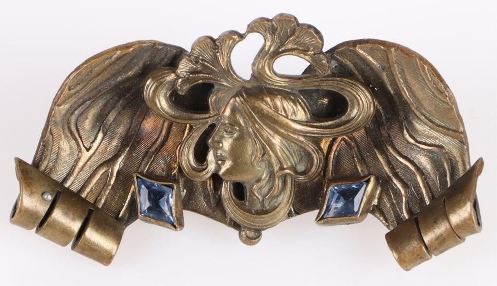 ANTIQUE GENUINE ART NOUVEAU BROOCH: Antique Genuine Art Nouveau Brooch. To feature woman at center of brooch and a replaced pin. Condition: Very fine. See images.