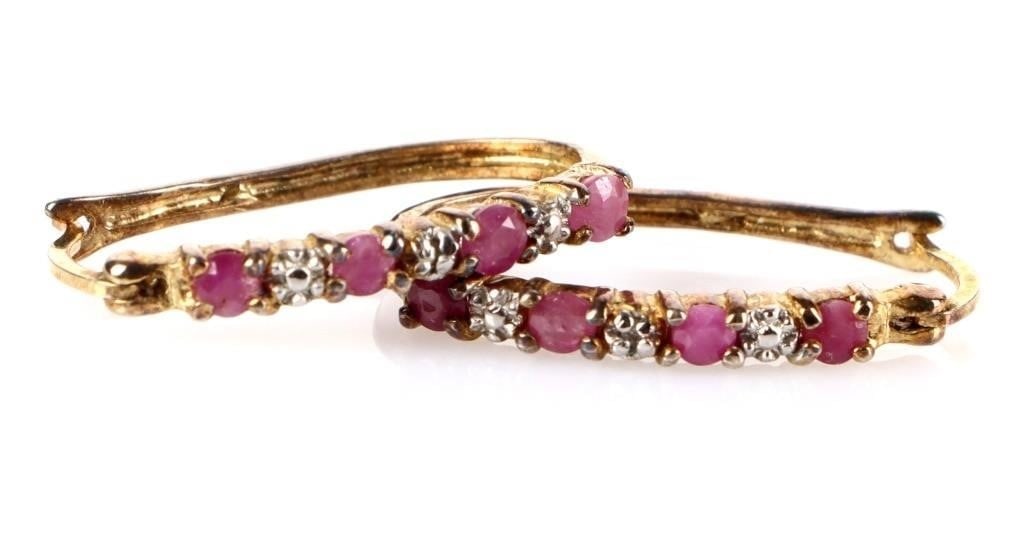 ANTIQUE STERLING RUBY LADIES HOOP EARRINGS: Antique sterling silver ruby hoop ladies earrings. Stone Type: Ruby Weight: 2.22 Grams Size: 1.0" Length Condition: Slight tarnishing.