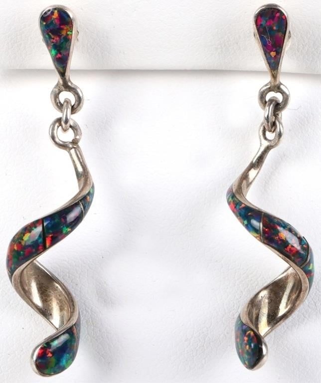 STERLING SILVER LADIES CORKSCREW EARRINGS: Sterling silver earrings in the shape of a corkscrew with pink and blue glittering stone along face. Weight: 2.94 grams Size: 1.5" long Condition: Very fine.