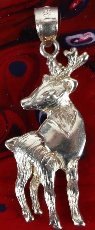 14K YELLOW GOLD DEER/REINDEER PENDANT: 14K yellow gold deer/reindeer pendant. Pendant features a detailed, textured, and polished full body deer or reindeer design with an open back Weight: 2.13 Grams Size: 1" Condition: Slight surface scr