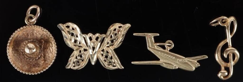 14K YELLOW GOLD LADIES PENDANTS PLANE MUSIC HAT--4: Lot of four 14k yellow gold ladies pendants, to include one airplane, one sombrero, one butterfly and one music note. Weight: 3.10 grams Size: 20.8 - 22.8 mm long Condition: See pictures.
