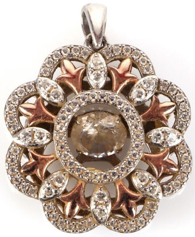 STERLING SILVER LADIES PENDANT WITH GLASS GEMSTONE: Sterling silver ladies pendant with glass gemstones. Pendant Is a floral design. Weight: 5.65 grams Size: 1" long Condition: Very fine.