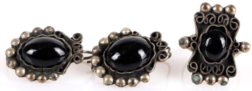 VINTAGE TAXACO BLACK GEM LADIES JEWELRY SET - (2): Vintage Taxaco black gem ladies jewelry set includes one ring, and a pair of matching earrings. Stone Type: Assorted Weight: 15.62 Grams Size: 8.00 U.S. & 1.00" Condition: Wear commensurate with age.