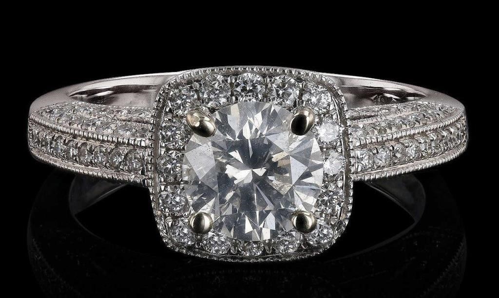 18K WHITE GOLD LADIES RING W/ 1.8CTW DIAMONDS EGL: One polished, stamped, and tested 18K white gold ring with a bright finish. The ring is mounted with: 1 genuine diamond center stone weighing 1.00 carat, and 120 genuine round diamonds weighing 0.80 c