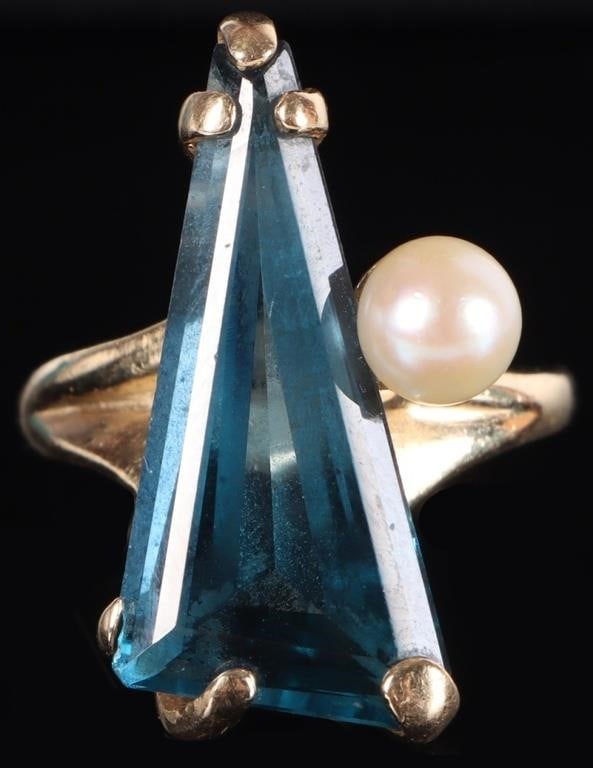 14K YELLOW GOLD BLUE TOPAZ PEARL LADIES RING: 14K yellow gold blue topaz pearl ladies ring. Gemstones to include one 5.83mm pearl, and one 23.72mm X 11.45mm modified triangular (right triangle) faceted blue topaz Stone Type: Assorted Weight: 7.27