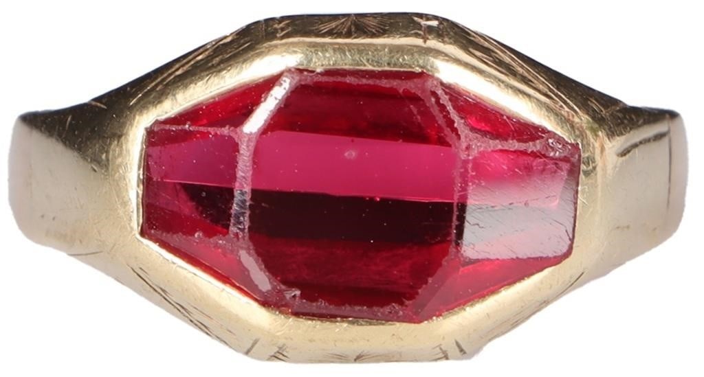 ~4.35CT OCTAGONAL RUBY 14K YELLOW GOLD MENS RING: 14k yellow gold mens ring with an approximately 4.35ct oblong octagonal-cut ruby center gemstone. The galleries feature mild Art Deco etching. Stone Type: Ruby Weight: 6.05 grams Size: US 11 Condition