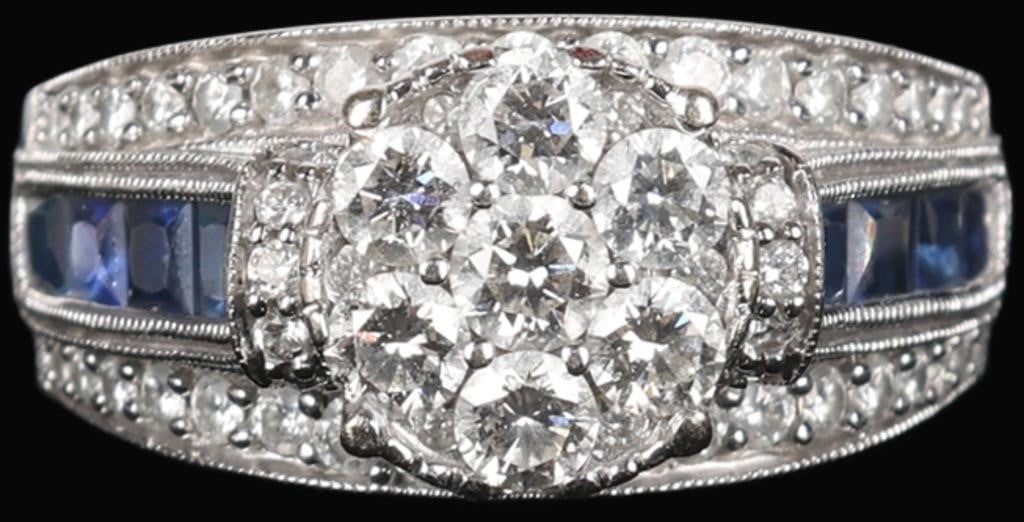 14K WHITE GOLD NATURAL DIAMOND SAPPHIRE RING: 14K white gold natural diamond sapphire cluster ladies ring. Gemstones to include seven 0.15ct round cut natural diamonds, fourteen 0.01ct round cut diamonds, thirty-four 0.01-0.03ct round cut