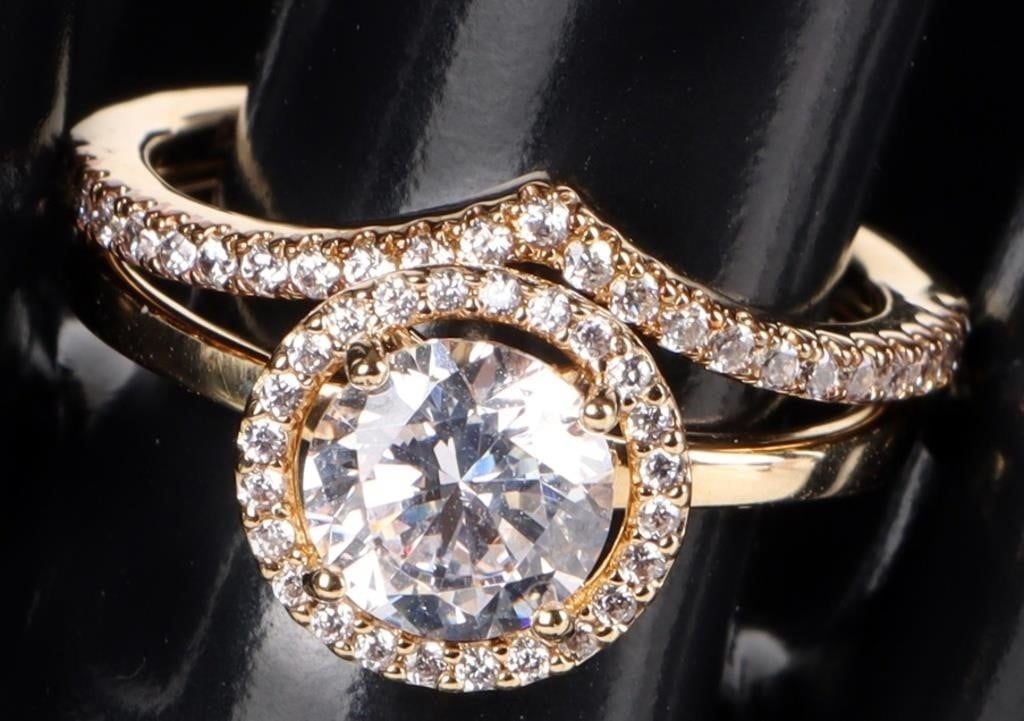 PANDORA 14K GOLD PLATED HALO WISHBONE SET: Pandora halo of gold sparkling wishbone ring set. This is a beautiful 14K yellow gold plated cubic zirconia ring set perfect to wear together or separate. Stone Type: CZ Weight: 3.88 Grams Size: US