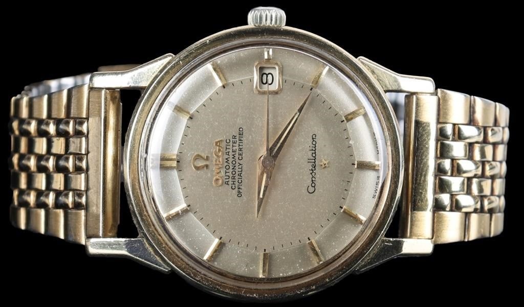 OMEGA CONSTELLATION AUTOMATIC CHRONOMETER WATCH: Omega Constellation Automatic Chronometer Men's wristwatch to include a stainless steel band, embossed observatory logo and an automatic chronometer movement. Stainless steel Wristwatch Omega Mens Wei