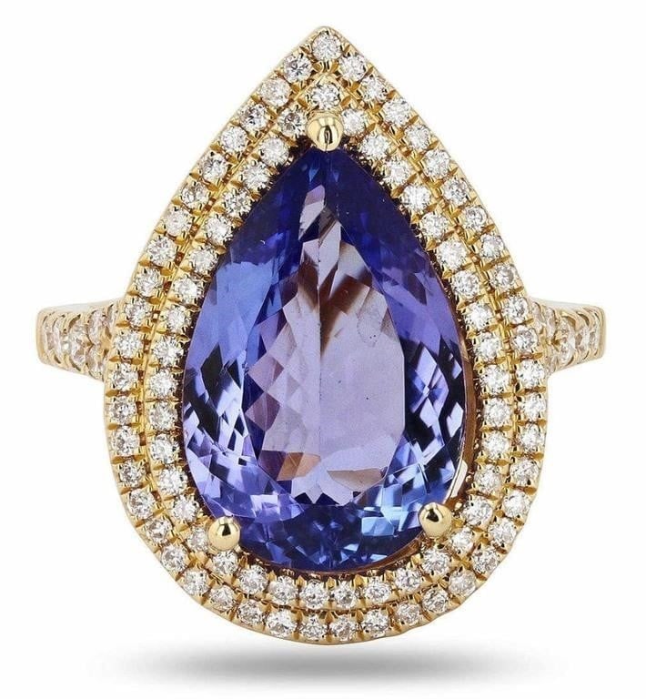 6.19CT TANZANITE & DIAMOND 14K YELLOW GOLD RING: One polished, stamped, and tested 14K yellow gold ring with a bright finish. The ring is mounted with 1 genuine faceted tanzanite center stone weighing approximately 6.19 carat, and 108 genuine round 