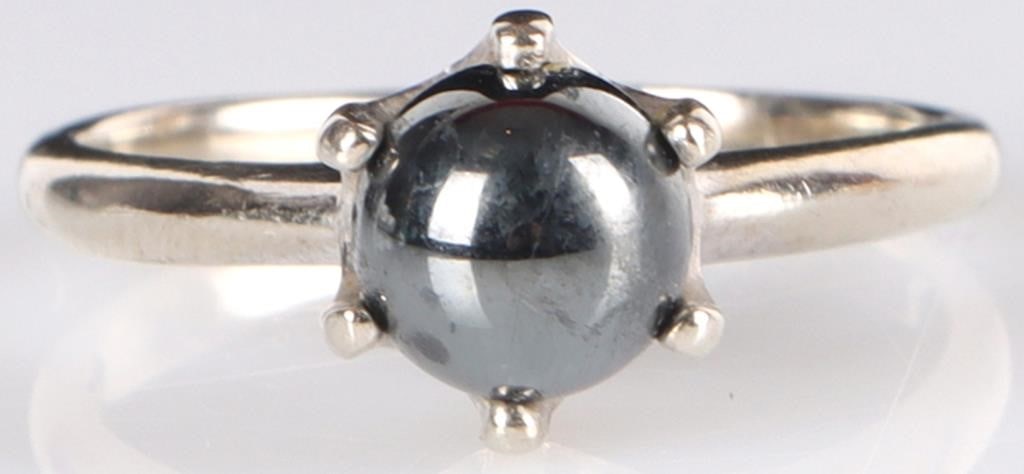 10K WHITE GOLD 7MM HEMATITE LADIES RING: 10K white gold 7MM hematite ladies ring. It is securely set in a 6 prong setting. Stone Type: Pearl Weight: 3.04 Grams Size: US 7.0 Condition: Some surface scratches from normal wear. See images for