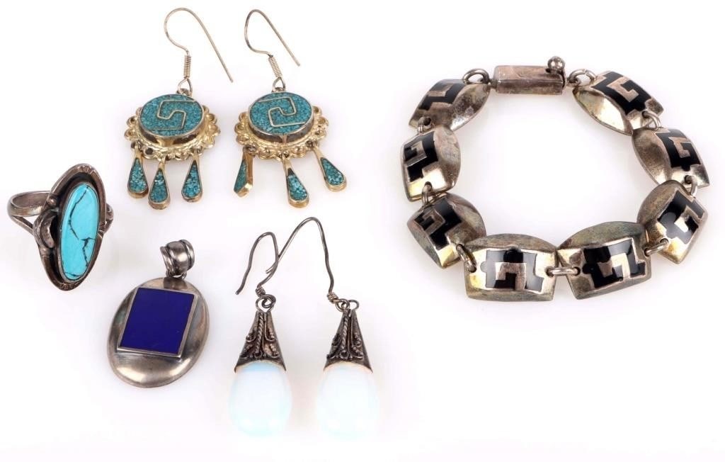 MEXICAN STERLING SILVER SOUTHWEST JEWELRY: Mexican sterling silver southwest jewelry to include: one Aztec-themed bracelet, one Aztec themed pair of mosaic turquoise dangle earrings, one pair of moonstone earrings, one lapis pendant, and one h