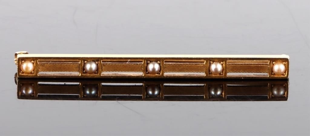 14K YELLOW GOLD SEED PEARL LADIES PIN: 14K yellow gold seed pearl ladies pin. Gemstones to include 5 seed pearls. Stone Type: Pearl Weight: 3.96 Grams Size: 2.00" Condition: Little to no wear, see images for details.