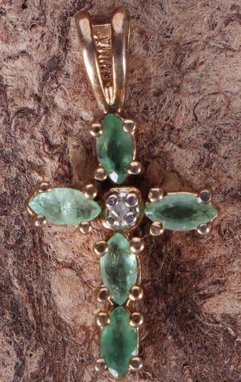 GOLD-TONE 925 LADIES PENDANT W/ EMERALD & DIAMOND: Gold-tone sterling silver ladies cross pendant with five 0.025ct marquise-cut emerald gemstones and a melee diamond in its center. Stone Type: Emeralds & Diamond Weight: 0.99 grams Size: 21 x 11 mm Co