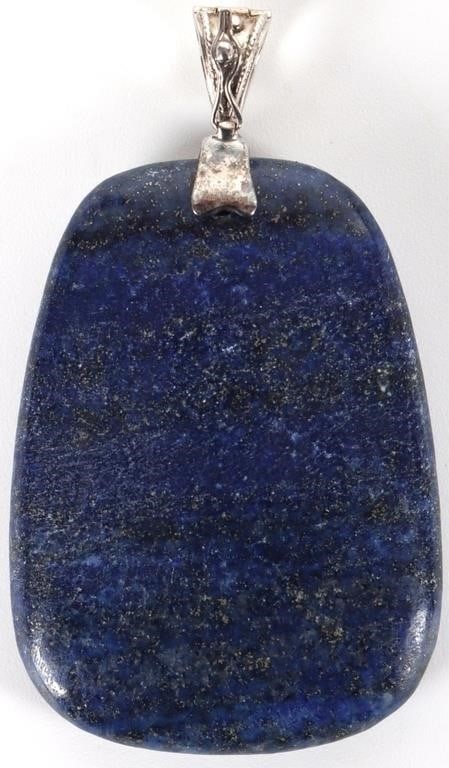 SW LAPIS LAZULI LADIES PENDANT W/ STERLING CLASP: Lapis lazuli ladies pendant with a Southwest style sterling silver clasp. Stone Type: Lapis Lazuli Size: 2.75 X 1.5" Condition: See pictures