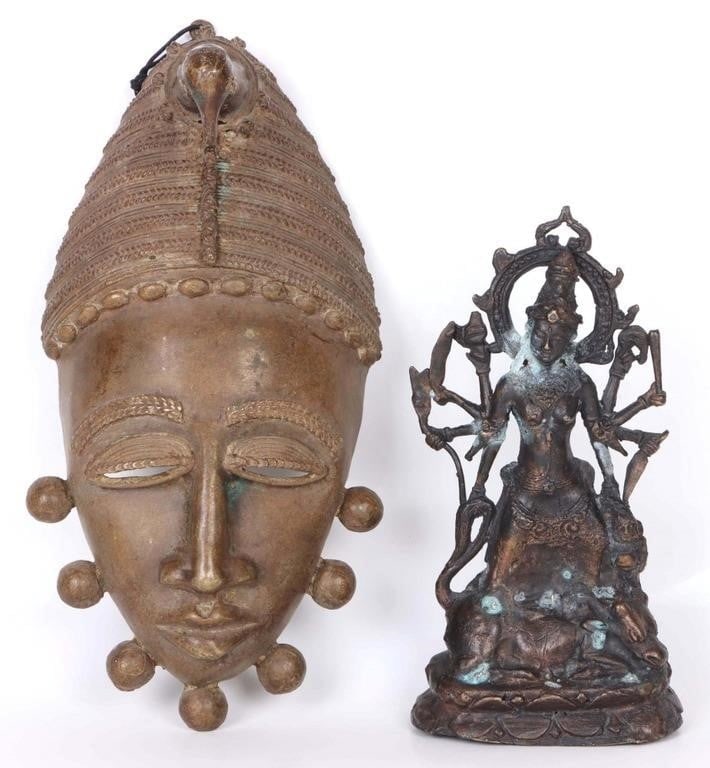 BRONZE KALI STATUE & BRONZE AFRICAN WALL MASK: Antique Bronze Buddhist Kali totem statue and one bronze African hanging wall mask. Size: 12" Largest Condition: Wear commensurate with age, see pictures for more detail. Needs cleaning.