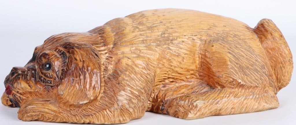 VINTAGE CARVED ST. BERNARD DOG WOOD FIGURE: Vintage carved St. Bernard dog wood figurine with an ichthys carved into the bottom. Size: 13.5" Length Condition: No chips or signs of repair. See images for complete condition.