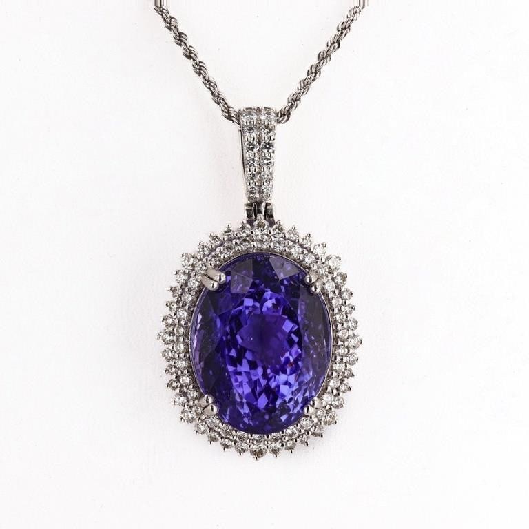 30.8CTW TANZ 1.42CTW DIAMOND PLATINUM NECKLACE GIA: One electronically tested platinum ladies cast & assembled tanzanite and diamond pendant with chain. Condition is new, good workmanship. The pendant features a tanzanite set within a tiered diamond fl