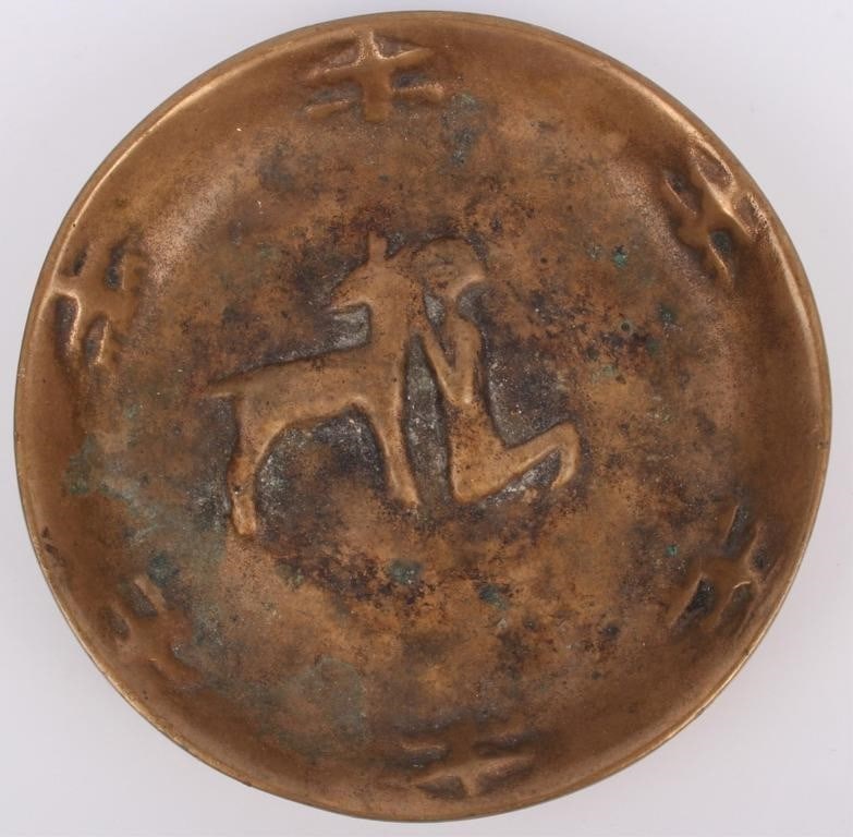 VINTAGE ART DECO BRONZE CARVED CENTAUR BOWL: Vintage art deco style bronze bowl engraved with religious carvings. In the center is the image of a person kneeling in front of a centaur (half human half horse mythical creature) with the same