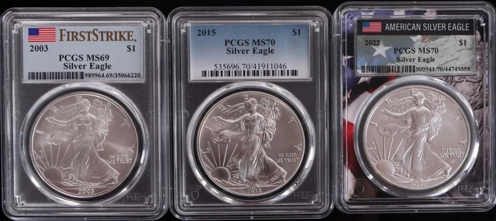 FINE SILVER 1OZT AMERICAN EAGLES PCGS MS-69/70-(3): Fine silver 1 Troy ounce American Eagles PCGS MS-69/70 to include one 2022, one 2015 W BU, and one 2003 W BU American Eagle. Weight: 93.312 Grams Condition: PCGS Mint State-69 & 70.