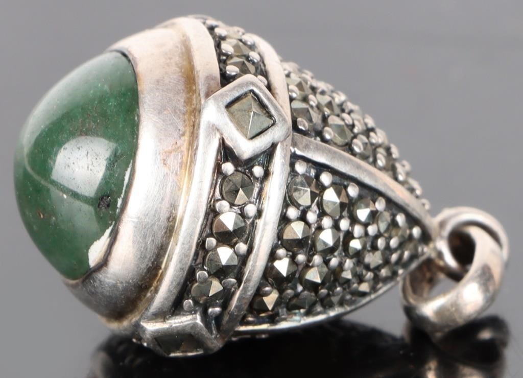 STERLING SILVER GREEN JADE MARCASITE PENDANT: Sterling silver green jade marcasite unisex pendant Stone Type: Assorted Weight: 11.93 Grams Size: 1.50" Condition: Little wear, see images for details.