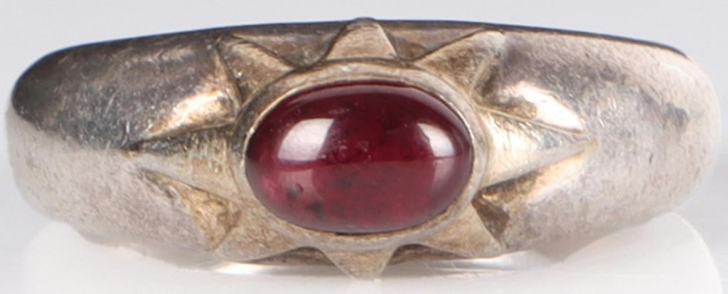 STERLING SILVER PINK TOURMALINE LADIES RING: Sterling silver pink tourmaline ladies ring. Gemstones to include one 0.50ct cabochon pink tourmaline. Stone Type: Tourmaline Weight: 5.43 Grams Size: 6.50 U.S. Condition: Some wear, see images for de