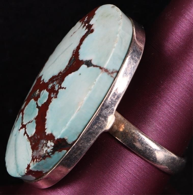 TURQUOISE SOUTHWEST STERLING SILVER MENS RING: Sterling silver men's ring with a large turquoise center stone. Stone Type: Turquoise Weight: 14.37 grams Size: US 9.75 Condition: NEW