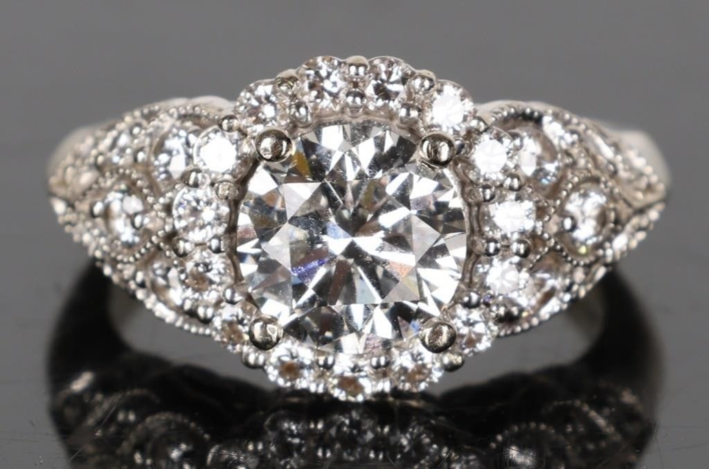 GIA 1.50CT NATURAL DIAMOND 14K ENGAGEMENT RING: This is a ladies natural diamond engagement ring set in 14K white gold. It features a GIA certified brilliant round center stone G in color, SI1 in clarity. The center stone is 1.5CT. The center stone