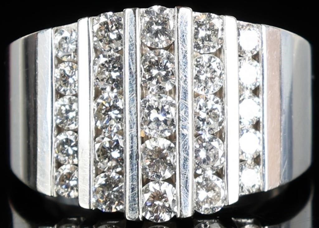 14K WHITE GOLD LADIES RING W/ IIA SYNTH DIAMONDS: 14k white gold ladies ring with twenty-five round-cut type IIA synthetic diamonds (five 0.1ct stones, ten 0.07ct stones, and ten 0.05ct stones). Stone Type: Synthetic Diamonds Weight: 11.62 grams Size