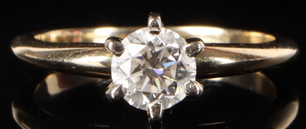 14K YELLOW GOLD NATURAL DIAMOND SOLITARE RING: 14K yellow gold natural diamond solitare ladies ring. Gemstones to include one 0.75ct round cut natural diamond. Diamond tested natural via Gemlogis short wave UV fluorescence. Stone Type: Diamond Wei