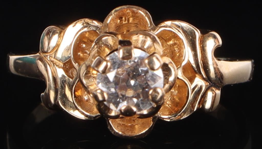 FLORAL 14K YELLOW GOLD LADIES RING W/ DIAMOND: 14k yellow gold ladies ring with a 0.33ct round-cut center diamond surrounded by floral sculpting on the face. Stone Type: Diamond Weight: 3.45 grams Size: US 4.75 Condition: See pictures.