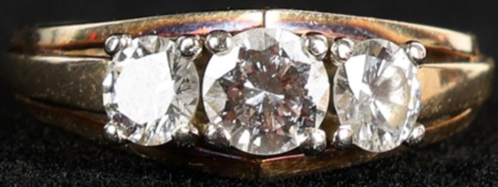 14K YELLOW GOLD NATURAL DIAMOND LADIES RING: 14K yellow gold natural diamond ladies ring. Gemstones to include one 0.33ct round cut natural diamond, and two 0.25ct round cut natural diamonds. Diamonds tested natural via Gemlogis short wave UV fl
