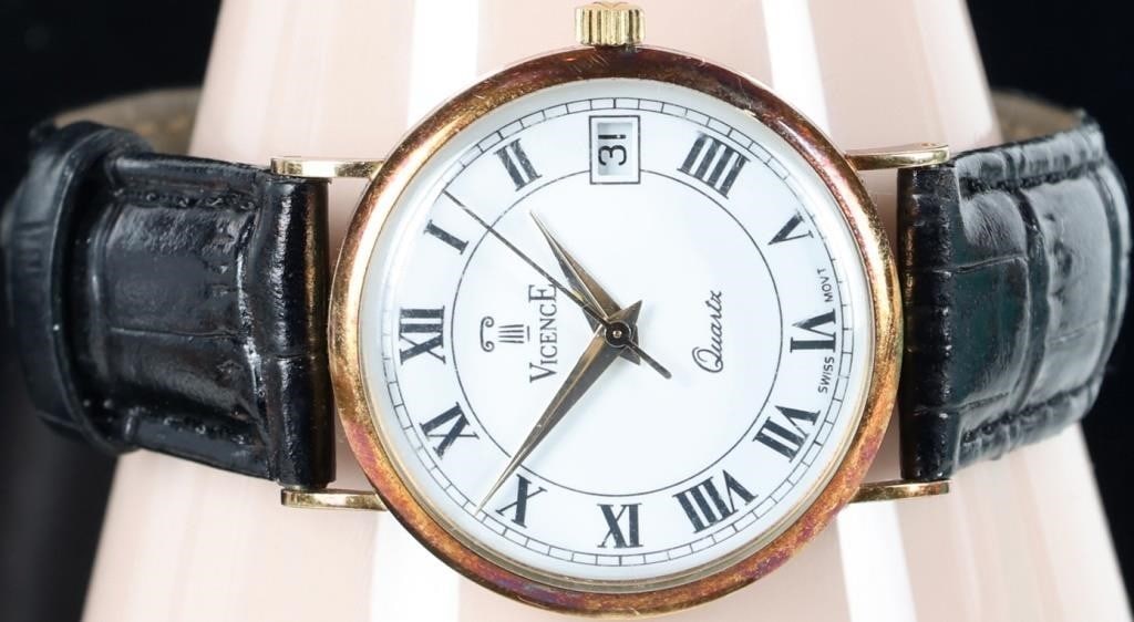 14K YELLOW GOLD VICENCE ITALIAN LEATHER WRISTWATCH: 14K yellow gold Vicence Milor Italy leather men's wristwatch to include an Italian black leather strap, 14K yellow gold case, quartz movement and a roman numeral analog dial. Yellow Gold Wristwatch Vi