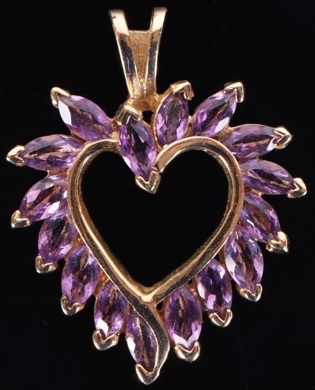 14K YELLOW GOLD LADIES PENDANT W/ 16 AMETHYST GEMS: 14k yellow gold ladies pendant studded with sixteen 0.03ct marquise-cut amethyst gemstones. Stone Type: Amethyst Weight: 3.16 Size: 27.2 x 21.6mm Condition: See pictures.